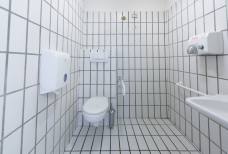 Hallenbad Meranarena - Toilette Tribüne
